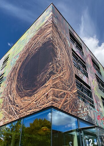 Fundermax Fassade Boardinghouse Hotel aus Max Compact Exterior in den Dekoren ID und 0070 sowie der Oberfläche NT