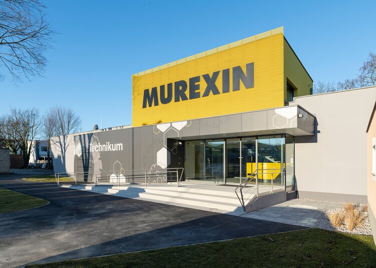 Fundermax Fassade Murexin Technikum aus Max Compact Exterior mit Individualdekor