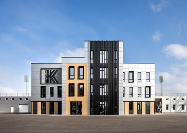 Facade of the IC Kolos Stadium featuring Fundermax Max Compact Exterior panels.